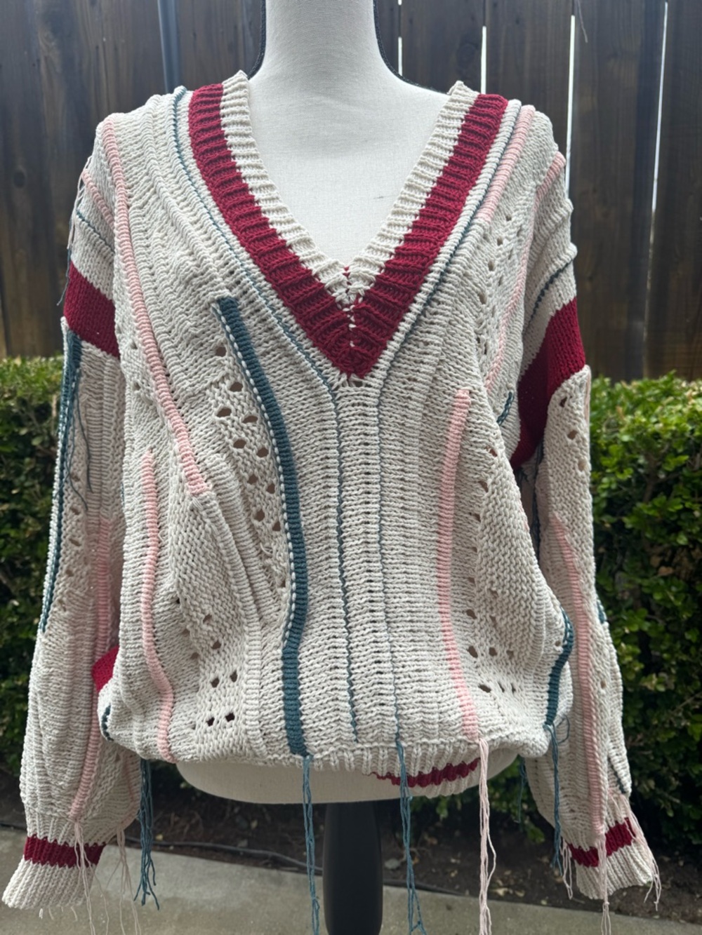 POL V-Neck Knit Sweater in Beige with Maroon, Teal, and Pink Stripes